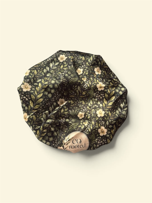 Purrty Dimples CQ rooted satin hair bonnet featuring a dark forest botanical floral print for hair protection.